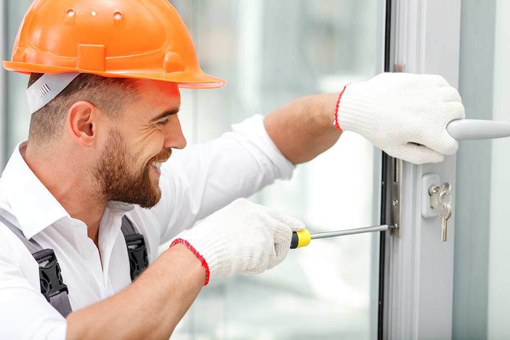 Locksmith fixing lock